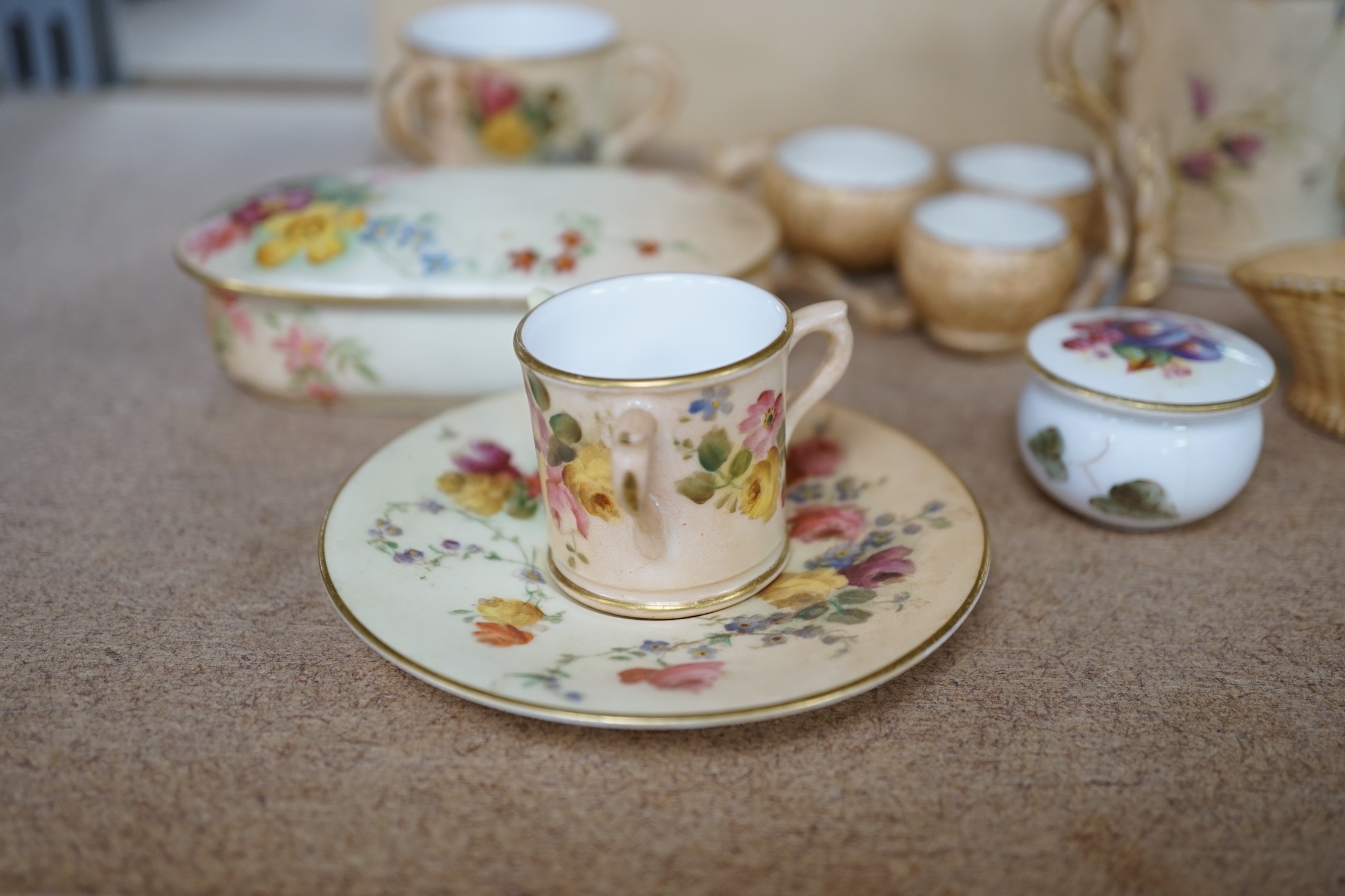 A group of Royal Worcester etc. miniatures including blush ivory tygs and a miniature fruit painted pot and cover, largest 6cm high (8). Condition - mostly fair